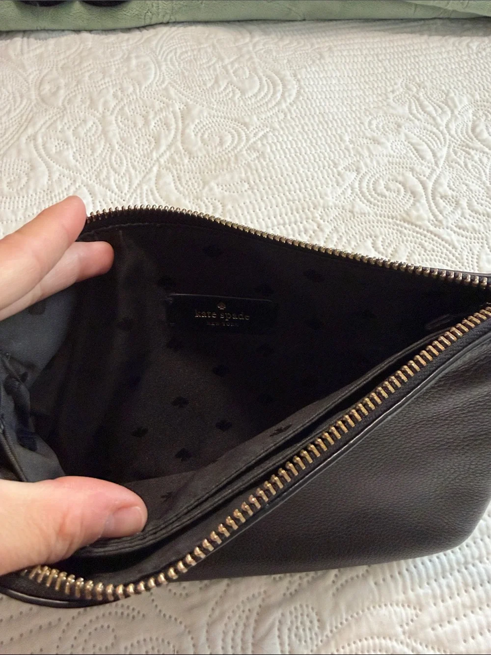 kate spade black leather wristlet with gold zipper